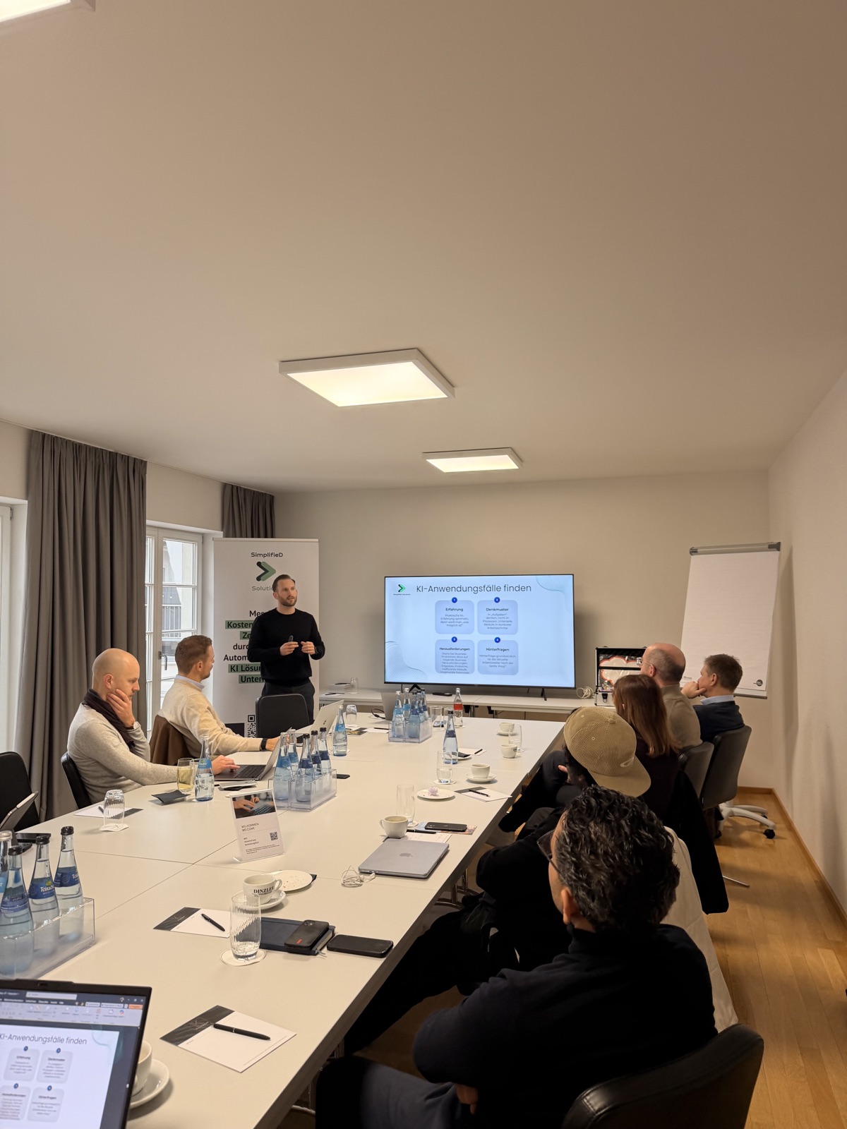 Workshop session with attendees in a meeting room